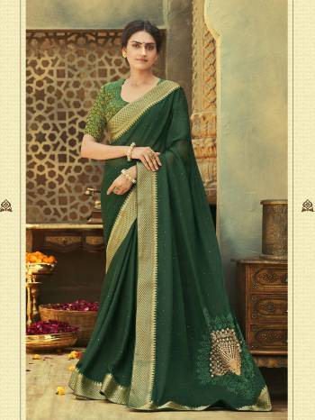 Grab This Pretty Elegant Looking Designer Saree In Fine Color Paired With Blouse. This Saree Are Chiffon And Blouse Are Art Silk Based Beautified With Pallu Embroidery,Diamond Work. Buy Now.