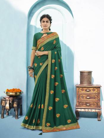 Garb This Party Wear Saree Are Fine Saree Paired With Blouse.This Embroidery And Diamond WorkSaree Is Vichitra Silk Based And Blouse Are Vichitra Silk Fabric. Buy This Pretty Saree Now.