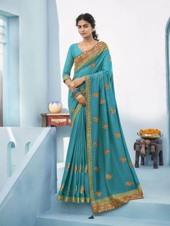 Garb This Party Wear Saree Are Fine Saree Paired With Blouse.This Embroidery And Diamond WorkSaree Is Vichitra Silk Based And Blouse Are Vichitra Silk Fabric. Buy This Pretty Saree Now.