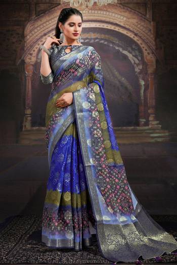 Garb This Party Wear Saree Are Fine Saree Paired With Contrased Blouse.This Heavy Wevon Designer With Digital Printed Saree Is Chanderi And Blouse Are Chanderi Fabric. Which Gives A Rich Look To Your Personality. Buy This Pretty Saree Now.