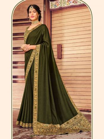 Grab This Pretty Elegant Looking Designer Saree In Fine Color Paired With Blouse. This Saree Are Vichitra Silk And Blouse Are Art Silk Based Beautified With Jacquard Pallu Border And Blouse. Buy Now.