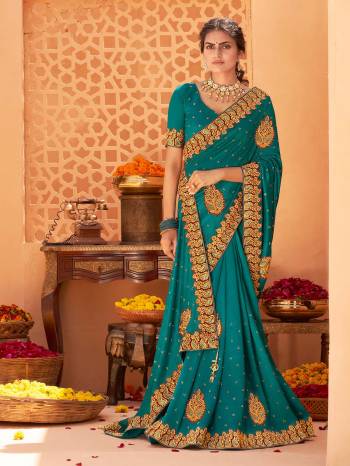 Adorn The Pretty Angelic Look Wearing This Heavy Designer Paich Butta Border And Diamond Work Saree In Fine Color Paired With Blouse. This Saree Is Fabricated On Vichitra Silk Paired With  Blouse.