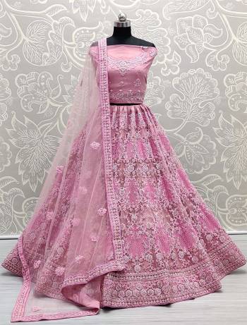 Attrective Bridal Partywear Heavy Designer Lehenga Choli And Dupatta In Light Color Fabricated On Net Beautified With Heavy Attractive Coading,Jari Embroidery And Zircon Diamond Work. 