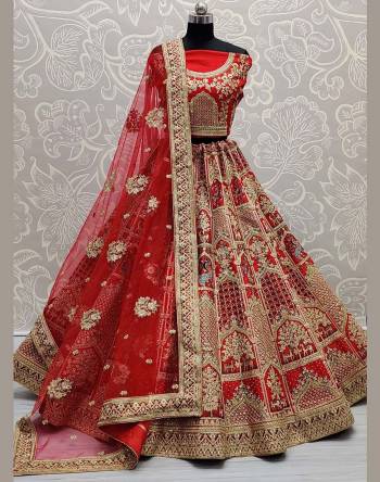 Looking Attrective Bridal Partywear Heavy Designer Lehenga Choli And Dupatta In Fine Color Fabricated On Slub Silk Beautified With Heavy Attractive Embroidery Work And Diamond Work. 