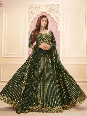 Garb This Weddind Season Heavy Designer Lehenga Choli And Dupatta In Fine Color Fabricated On Silk Satin Beautified With Heavy Attractive Sequance Embroidery Work. 