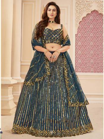 Garb This Weddind Season Heavy Designer Lehenga Choli And Dupatta In Fine Color Fabricated On Silk Satin Beautified With Heavy Attractive Sequance Embroidery Work. 