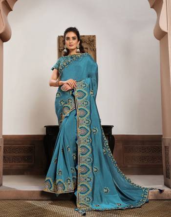 Look Attractive Wearing This Fine Colored Saree Paired With Blouse.  This Heavy Designer Saree Is Silk Georgette Based Which Gives A Rich Look To Your Personality. Buy This Pretty Saree Now.