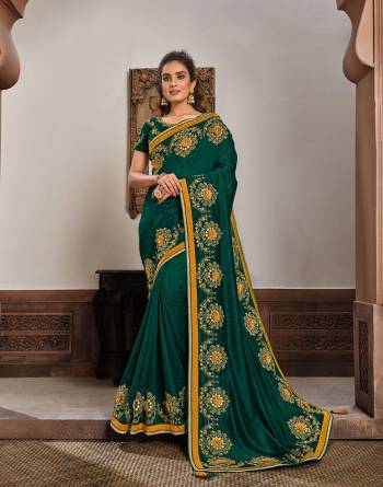 Look Attractive Wearing This Fine Colored Saree Paired With Blouse.  This Heavy Designer Saree Is Silk Georgette Based Which Gives A Rich Look To Your Personality. Buy This Pretty Saree Now.