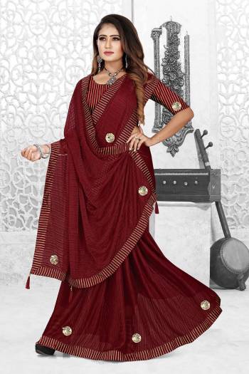 Grab This Pretty Elegant Looking Designer Saree In Fine Color Paired With Blouse. This Saree And Blouse Are Spandex Poly Blend Based Beautified With Wevon Designer. Buy Now.