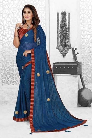 Grab This Pretty Elegant Looking Designer Saree In Fine Color Paired With Blouse. This Saree And Blouse Are Spandex Poly Blend Based Beautified With Wevon Designer. Buy Now.