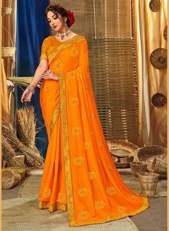 Look Attractive Wearing This Fine Colored Saree Paired With Blouse.This Heavy Designer Embroidery Saree Is Vichitra Silk Based Which Gives A Rich Look To Your Personality. Buy This Pretty Saree Now.