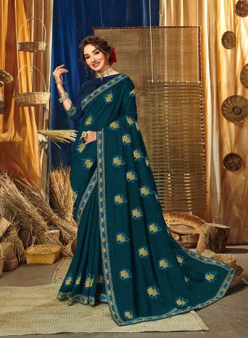 Look Attractive Wearing This Fine Colored Saree Paired With Blouse.This Heavy Designer Embroidery Saree Is Vichitra Silk Based Which Gives A Rich Look To Your Personality. Buy This Pretty Saree Now.