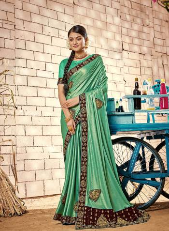 Attractive Look Wearing This Partywear Fine Colored Saree Paired With Blouse.This Heavy Designer Saree Is Imported Fabric Based Which Gives A Rich Look To Your Personality. Buy This Pretty Saree Now.