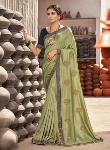 Look Attractive Wearing This Fine Colored Saree Paired With Blouse.This Heavy Designer Saree Is Vichitra Silk Based And Art Silk Blouse Which Gives A Rich Look To Your Personality. Buy This Pretty Saree Now.