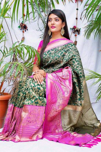 Looking This Partywear Saree Are Fine Saree Paired With Blouse.  This Designer Wevon Jari Work Saree And Blouse Are Banarasi Silk Fabric. Which Gives A Rich Look To Your Personality. Buy This Pretty Saree Now.