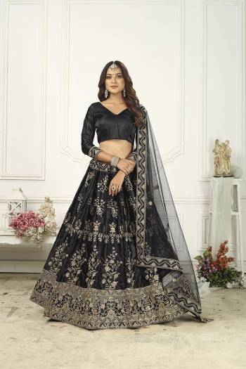 Attrective Partywear Heavy Designer Lehenga Choli In Fine Color Fabricated On Silk Beautified And Dupatta Are Net With Heavy Attractive Embroidery Work. 