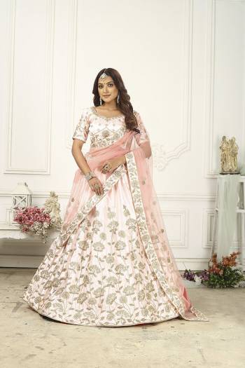 Attrective Partywear Heavy Designer Lehenga Choli In Fine Color Fabricated On Silk Beautified And Dupatta Are Net With Heavy Attractive Embroidery Work. 