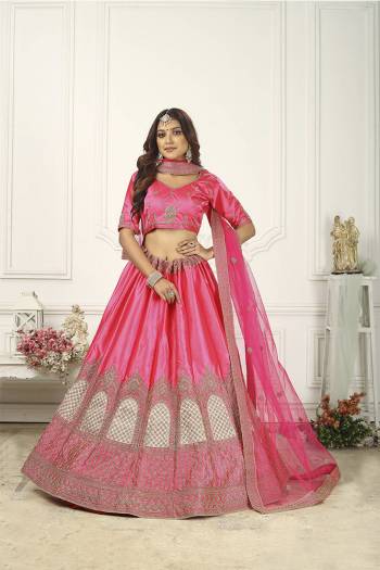 Attrective Partywear Heavy Designer Lehenga Choli In Fine Color Fabricated On Silk Beautified And Dupatta Are Net With Heavy Attractive Embroidery Work. 