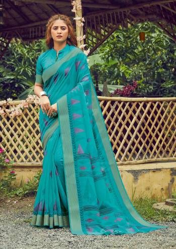 Garb This Partywear Saree Are Fine Saree Paired With Blouse.This Heavy Designer Wevon Work Saree And Blouse Are Cotton Based Fabric. Buy This Pretty Saree Now.