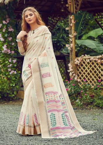 Garb This Partywear Saree Are Fine Saree Paired With Blouse.This Heavy Designer Wevon Work Saree And Blouse Are Cotton Based Fabric. Buy This Pretty Saree Now.