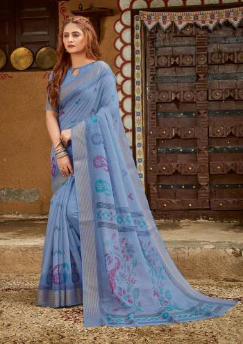 Garb This Partywear Saree Are Fine Saree Paired With Blouse.This Heavy Designer Wevon Work Saree And Blouse Are Cotton Based Fabric. Buy This Pretty Saree Now.