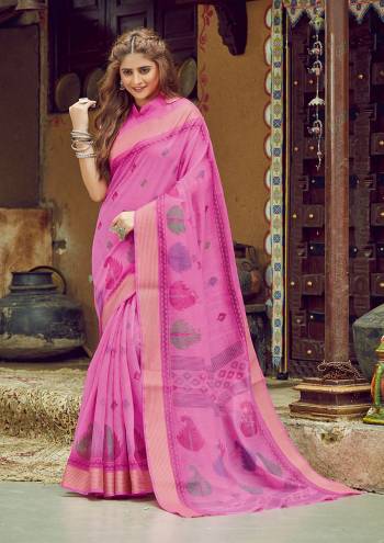 Garb This Partywear Saree Are Fine Saree Paired With Blouse.This Heavy Designer Wevon Work Saree And Blouse Are Cotton Based Fabric. Buy This Pretty Saree Now.