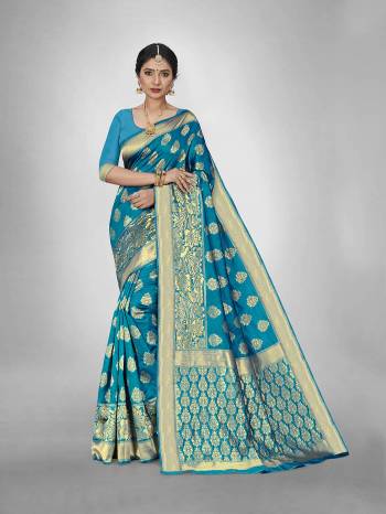  This Fine Colored Saree Paired With Blouse.This Heavy Designer Wevon Saree Is Art  Silk Based And Blouse Which Gives A Rich Look To Your Personality. Buy This Pretty Saree Now.