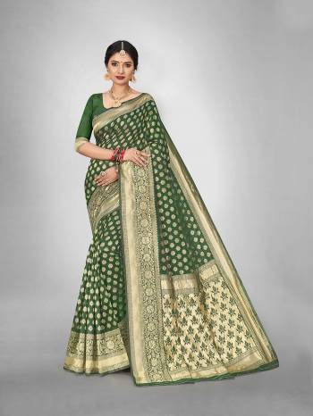 Garb This Fine Colored Saree Paired With Blouse.This Heavy Designer Wevon Saree Is Art  Silk Based And Blouse Which Gives A Rich Look To Your Personality. Buy This Pretty Saree Now.