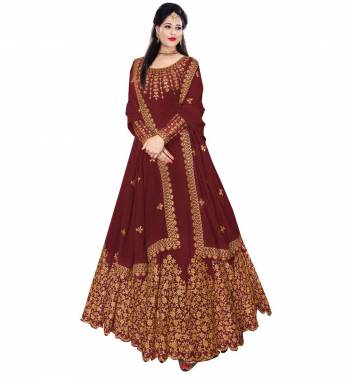 Flaunt Your Rich And Elegant Taste Wearing This Designer Long Gown With Dupatta In Dark Color. This  Pretty Gown Is Fabricated On Georgette Beautified With Embroidery Work. Its Fabric Is Soft Towards Skin And Easy To Carry All Day Long. 