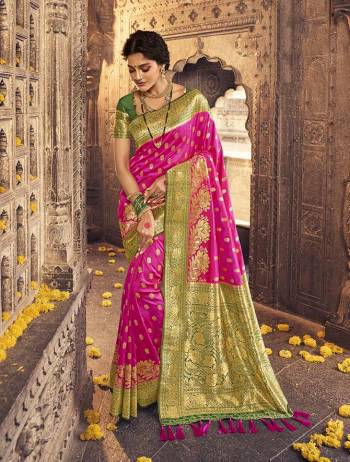 Garb This Partywear Saree Are Fine Saree Paired With Blouse.This Heavy Designer Wevon Work Saree And Blouse Are Banarasi Silk Based Fabric. Buy This Pretty Saree Now.