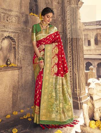 Garb This Partywear Saree Are Fine Saree Paired With Blouse.This Heavy Designer Wevon Work Saree And Blouse Are Banarasi Silk Based Fabric. Buy This Pretty Saree Now.