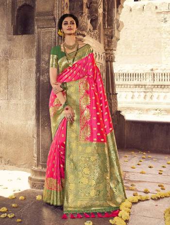 Garb This Partywear Saree Are Fine Saree Paired With Blouse.This Heavy Designer Wevon Work Saree And Blouse Are Banarasi Silk Based Fabric. Buy This Pretty Saree Now.