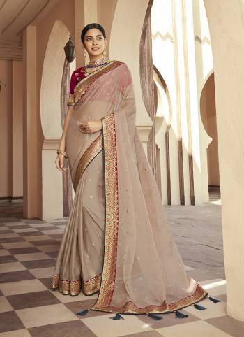 Attrective This Partywear Saree Are Fine Saree Paired With Blouse.This Butti Embroidery Work Saree Are Soft Organza And Blouse Are Art Silk Wevon Design Based Fabric. Buy This Pretty Saree Now.