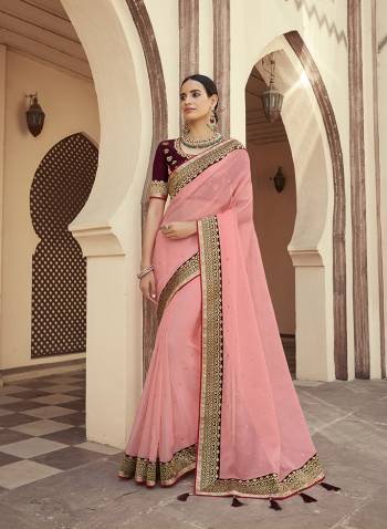 Attrective This Partywear Saree Are Fine Saree Paired With Blouse.This Butti Embroidery Work Saree Are Soft Organza And Blouse Are Art Silk Wevon Design Based Fabric. Buy This Pretty Saree Now.
