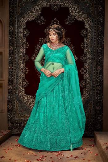 Attrective Wedding Season Partywear Heavy Designer Lehenga Choli And Dupatta In Fine Color Fabricated On Net Beautified With Heavy Attractive Thread,Seaquance Embroidery Work. 