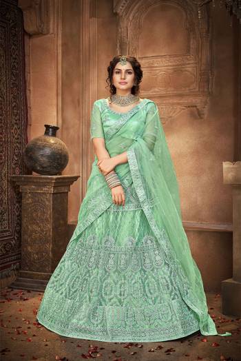 Attrective Wedding Season Partywear Heavy Designer Lehenga Choli And Dupatta In Fine Color Fabricated On Net Beautified With Heavy Attractive Thread,Seaquance Embroidery Work. 