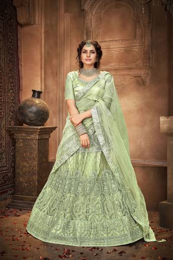 Attrective Wedding Season Partywear Heavy Designer Lehenga Choli And Dupatta In Fine Color Fabricated On Net Beautified With Heavy Attractive Thread,Seaquance Embroidery Work. 