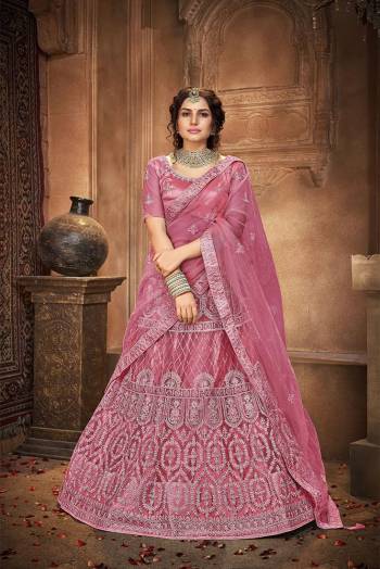 Attrective Wedding Season Partywear Heavy Designer Lehenga Choli And Dupatta In Fine Color Fabricated On Net Beautified With Heavy Attractive Thread,Seaquance Embroidery Work. 