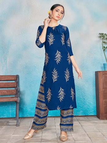 This Designer Readymade Suit In Lovely Dark Color.?Its Pretty Foil Print Top Is Rayon Based Paired With Rayon Bottom. Which Gives An Attractive To The Suit.