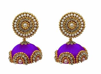 Give An Enhanced Look To Your Personality By Pairing Up This Beautiful Earring Set With Your Ethnic Attire. This Pretty Set Is In Meching Color Beautified With Silk Thread,Stone Work. Buy Now.