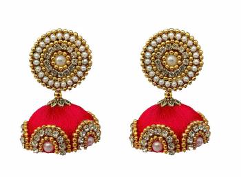 Give An Enhanced Look To Your Personality By Pairing Up This Beautiful Earring Set With Your Ethnic Attire. This Pretty Set Is In Meching Color Beautified With Silk Thread,Stone Work. Buy Now.