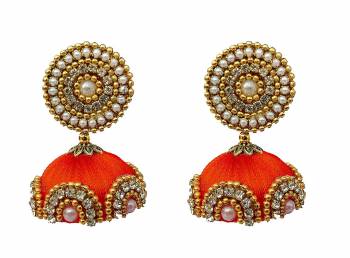 Give An Enhanced Look To Your Personality By Pairing Up This Beautiful Earring Set With Your Ethnic Attire. This Pretty Set Is In Meching Color Beautified With Silk Thread,Stone Work. Buy Now.