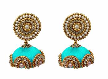 Give An Enhanced Look To Your Personality By Pairing Up This Beautiful Earring Set With Your Ethnic Attire. This Pretty Set Is In Meching Color Beautified With Silk Thread,Stone Work. Buy Now.