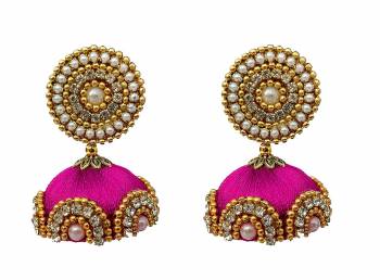 Give An Enhanced Look To Your Personality By Pairing Up This Beautiful Earring Set With Your Ethnic Attire. This Pretty Set Is In Meching Color Beautified With Silk Thread,Stone Work. Buy Now.