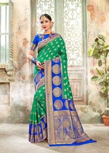 Look Attractive Wearing This Fine Colored Saree Paired With Contreased Blouse.This Heavy Designer Wevon Saree Is Banarasi Silk Based Which Gives A Rich Look To Your Personality. Buy This Pretty Saree Now.