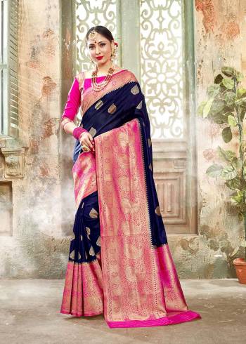 Look Attractive Wearing This Fine Colored Saree Paired With Contreased Blouse.This Heavy Designer Wevon Saree Is Banarasi Silk Based Which Gives A Rich Look To Your Personality. Buy This Pretty Saree Now.