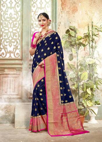 Look Attractive Wearing This Fine Colored Saree Paired With Contreased Blouse.This Heavy Designer Wevon Saree Is Banarasi Silk Based Which Gives A Rich Look To Your Personality. Buy This Pretty Saree Now.