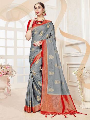 Attractive Wearing This Fine Colored Saree Paired With Contreased Blouse.This Heavy Designer Wevon Saree Is Banarasi Silk Based Which Gives A Rich Look To Your Personality. Buy This Pretty Saree Now.