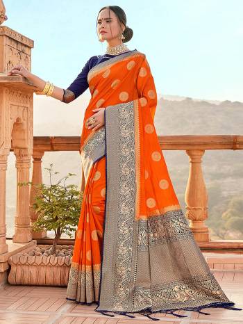 Garb This Fine Colored Saree Paired With Contreased Blouse.This Heavy Designer Wevon Saree Is Banarasi Silk Based Which Gives A Rich Look To Your Personality. Buy This Pretty Saree Now.