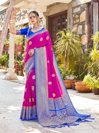 Garb This Fine Colored Saree Paired With Contreased Blouse.This Heavy Designer Wevon Saree Is Banarasi Silk Based Which Gives A Rich Look To Your Personality. Buy This Pretty Saree Now.